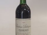 a bottle of wine that is sitting on a table