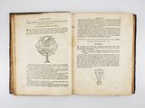 an open book with a drawing of a glass of wine on it