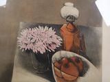 a picture of a picture of a vase with flowers on it