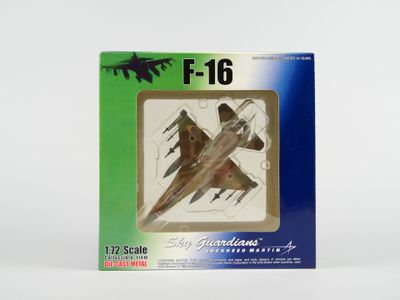 une boîte contenant une maquette d'avion de chasse