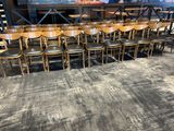 many chairs that are lined up on the floor