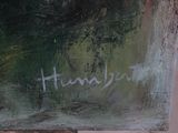 a close up of a painting with writing on it