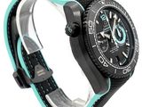 a close up of a wrist watch with a black and blue strap