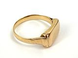 an image of a close up of a gold ring on a white surface