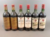 six bottles of wine are lined up in a row