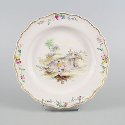 a white plate with a picture of a mouse on it
