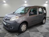 a picture of a small grey van parked in a garage