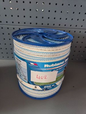 a plastic container with a blue lid on a shelf in a store