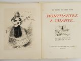 a book with a picture of a woman playing a guitar