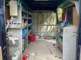a van that has a lot of tools in the back