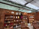 a room with a lot of furniture inside of it