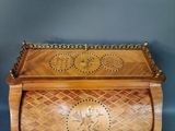 a wooden box that has a design on it