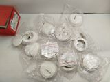 many rolls of toilet paper wrapped in plastic on the counter