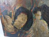un tableau accroché au mur représentant une femme et un homme