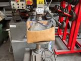a machine that is sitting on a table in a garage