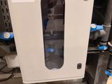 a picture of a water dispenser in a basement