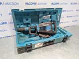 a blue tool box with a drill and other tools in it