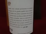 a bottle of wine that is sitting on a table