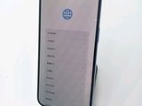 a close up of a cell phone on a table