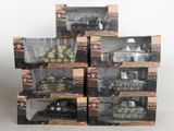 a stack of toy tanks that are sitting on top of each other