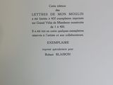 a close up of a book with a black and white cover