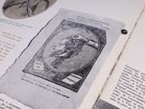 an open book with a picture of a man on it