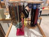 a display of necklaces and bracelets on display in a store