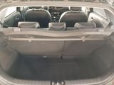 a trunk of a car with a bunch of seats in it