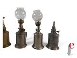 three different types of antique oil lamps are shown on a white background