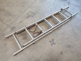 a ladder that is laying on the ground