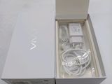 a box that has a charger and a cable in it