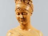 a statue of a woman with a turban on her head