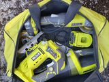a yellow tool bag with tools in it on the ground