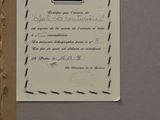 a picture of a certificate on the wall of a building