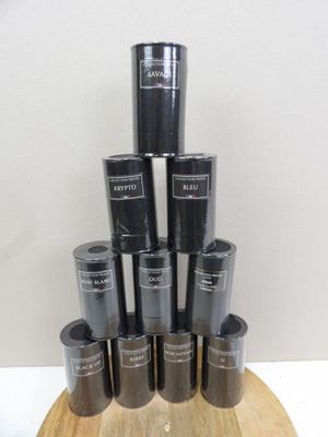 a stack of coffee cups sitting on a wooden stand