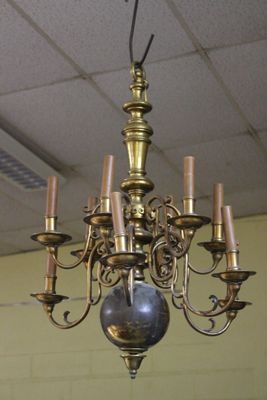 a chandelier hanging from the ceiling in a room