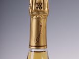 a bottle of wine that is sitting on a table