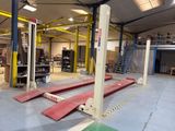 an image of a warehouse with a lot of equipment in it