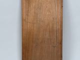 an image of a piece of wood with a label on it