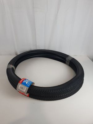 a close up of a tire tire on a white surface
