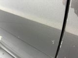 a close up of a car ' s door handle and door handle