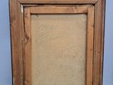 an old picture frame with a picture of a cat in it