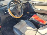 the interior of a car with a steering wheel and a steering wheel