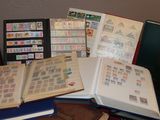 many different types of stamps on the pages of a book