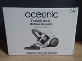 packaging of a vacuum cleaner sitting on a wooden table