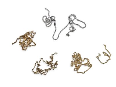 four different types of necklaces on a white surface
