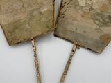 pair of antique brass hand fans with handles