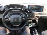 the interior of a car with a steering wheel, dashboard, and dash board