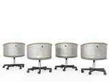 three drum stools with wheels on a white surface with a white background
