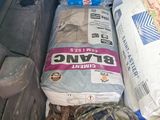 a pile of items in the back of a truck
